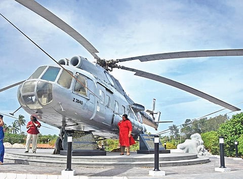 Kanayi Kunhiraman’s Mermaid statue at Shankhumugham alongside which a helicopter has been installed. Placing the helicopter here has kicked up a row | B P Deepu