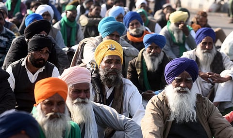 Farmers during their ongoing agitation against new farm laws at Ghazipur border in New Delhi. (Photo | Parveen Negi, EPS)