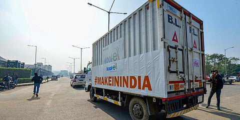 First consignment of Covishield vaccine dispatched from Pune's SII being transported in a temperature-controlled truck upon arrival at Delhi's IGI Airport on Tuesday. (Photo | PTI)