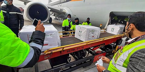 First consignment of COVID-19 vaccination arrives at Delhi Airport in a special SpiceJet flight from Pune. (Photo | PTI)