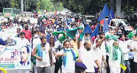 A file picture of activists protesting against the new farm laws, in Bengaluru