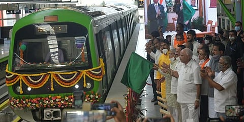 Chief Minister BS Yediyurappa flagging off the a metro train from the new station.(Photo | Meghana Sastry, EPS)