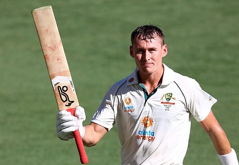 Australia's batsman Marnus Labuschagne acknowledges applauds from the spectators as he walks back to pavilion after dismissal on day one of the fourth Test. (Photo | AFP)