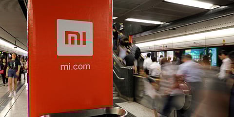 An advertisement for Xiaomi is displayed at a subway station in Hong Kong. (File photo| AP)