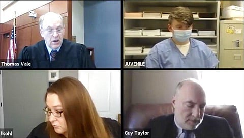 Logan T. Kruckenberg-Anderson, appears by video conference with Circuit Judge Thomas Vale, top left, Assistant District Attorney Laura Kohl and assistant state public defender Guy Taylor. (Photo | AP)