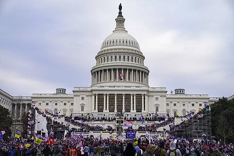 This file photo from Wednesday Jan. 6, 2021, shows Trump supporters swarming the Capitol, as Congress prepares to affirm President-elect Joe Biden's victory. (Photo | AP)