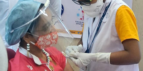 A nurse administers the COVID-19 vaccine to the frontline workers after the virtual launch of the COVID-19 vaccination. (File photo| PTI)