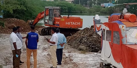 Regional Director of Municipal Administration inspects the lake on Jan 11 and urges the Municipality to restore it. (Photo | EPS)