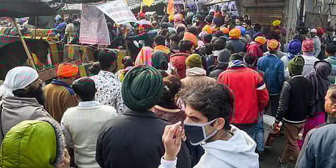Farmers and their supporters during their ongoing agitation over the new farm laws in New Delhi. (Photo| PTI)