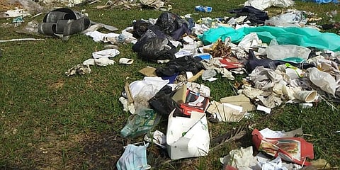Biomedical waste including PPE kits, medicene and syringes dumped near alongside the service road in Nazarthpet, near Poonamallee in Chennai (Special arrangement)