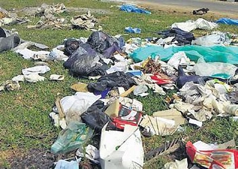 Biomedical waste dumped along service road at Nazarathpet in Chennai | Express
