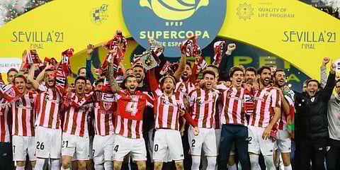 Athletic Bilbao players celebrate after winning the Spanish Super Cup final against Barcelona. (Photo | AFP)