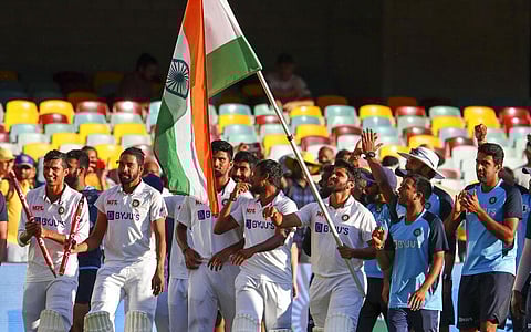 Indian players celebrate after defeating Australia by three wickets on the final day of the fourth cricket test at the Gabba, Brisbane. (Photo | AP)