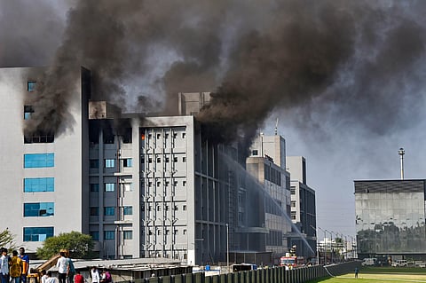 Smoke billows out after a massive fire broke out at the Serum Institute of India, in Pune. (Photo| PTI)