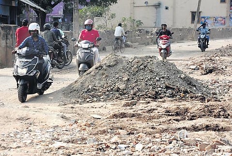 Motorists struggle to drive on Madha Kovil Street, at Nerkundram | R Satish Babu