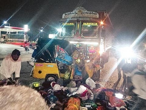 The mangled remains of the auto-rickshaw after an SUV hit it while overtaking a container truck, at Angadipet in Pedda Adeselapalli mandal in Nalgonda on Thursday
