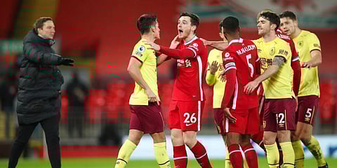 Liverpool's and Burney's players argue during the English Premier League match at Anfield. (Photo | AP)