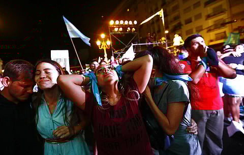 Anti-abortion activists react after lawmakers passed a bill that legalizes abortion, outside Congress in Buenos Aires, Argentina.(Photo | AP)