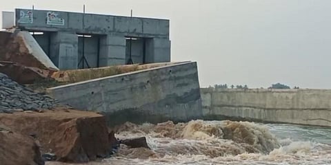 A newly constructed check dam across Thalavanur and Yenathirimangalam was found damaged. (Photo | EPS)
