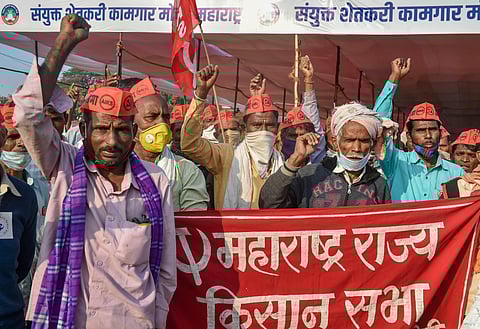 Farmers raise slogans during their 'Akhil Bharatiya Kisan Sabha', at Azad Maidan in Mumbai. (Photo| PTI)