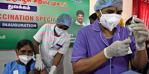 A health care worker getting vaccinated with Covishield dose in Coimbatore Medical College Hospital. (Photo | U Rakesh Kumar, EPS)