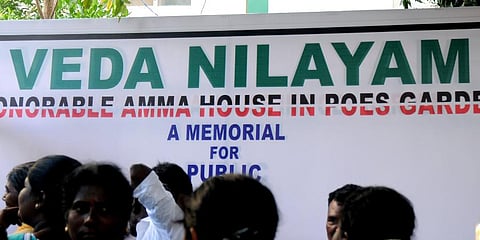 A banner showing the promise of converting Veda Nilayam, the official residence of late AIADMK supremo J Jayalalithaa into a memorial. (Photo | D Sampathkumar, EPS)