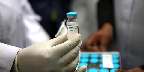 A health official shows Covaxin dose. (File Photo | Shekhar Yadav, EPS)