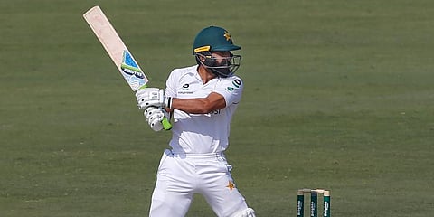 Pakistan's batsman Fawad Alam follows the ball after playing a shot for boundary during the second day of the first Test match against South Africa at the National Stadium, in Karachi. (Photo | AP)