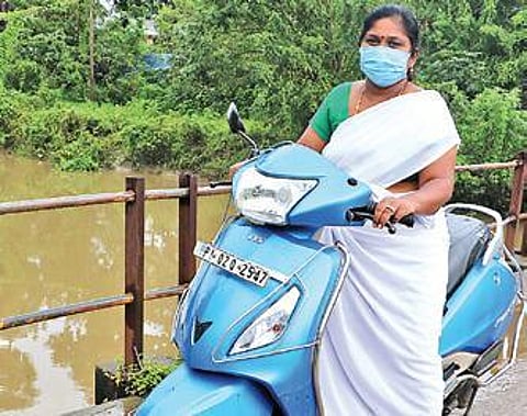 Geetha on her way to one of the nine hamlets in Kattumavadi