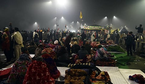 Farmers gather at the site along a blocked highway during a demonstration against the central government's recent agricultural reforms. (Photo | Parveen Negi/EPS)