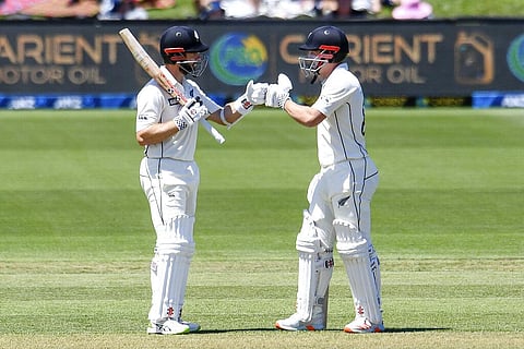 New Zealand's Kane Williamson and Henry Nicholls, right, gesture during play on day two of the second cricket test between Pakistan and New Zealand at Hagley Oval, Christchurch. (Photo | AFP)