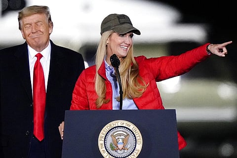 Sen. Kelly Loeffler, R-Ga., speaks as President Donald Trump listens during a campaign rally in support of Senate candidates Sen. Kelly Loeffler, R-Ga., and David Perdue in Dalton, Ga. (Photo | AP)