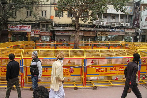 Police barricades set up near the site where a temple was demolished in Chandni Chowk Delhi Monday Jan. 4 2021. (Photo | PTI)