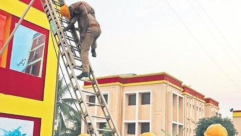 Fire fighters conduct a mock safety drill during the inauguration of Fire Park in Bhubaneswar on Tuesday.
