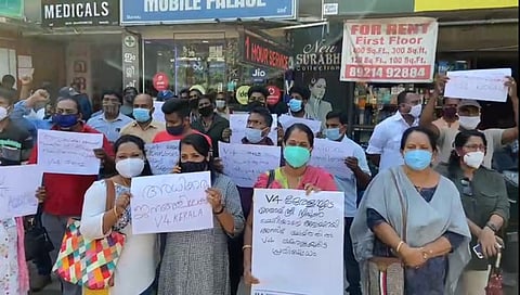 V4Kerala activists holding a demonstration near the Maradu police station on Wednesday to protest the arrests (Photo | Express)