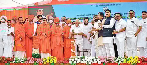 Chief Minister B S Yediyurappa, Deputy CM Laxman Savadi, KPCC working president Eshwar Khandre, other leaders and Lingayat seers at the foundation stone-laying ceremony for Anubhava Mantapa, in Basava