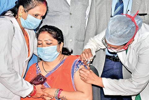 A healthcare worker being vaccinated during a dry run for the Covid-19 vaccine at Victoria Hospital in Jabalpur on Friday | pti
