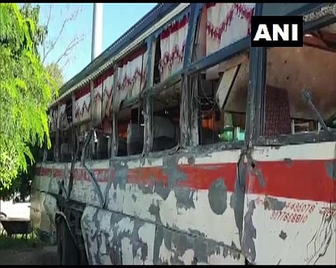 The bus seen in a damaged condition after collision with a dumper truck which killed 7 people. (Photo | Twitter/ANI)