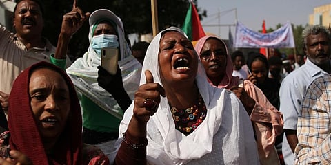 Sudanese participate in a demonstration, in Khartoum. (Photo | AP)