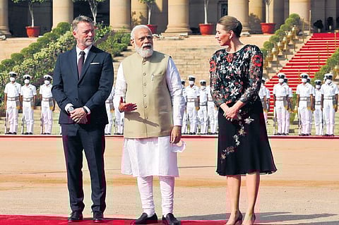 PM Modi with his Danish counterpart Mette Frederiksen and her husband during a ceremonial reception at Rashtrapati Bhavan in New Delhi on Saturday. (Photo | Express)