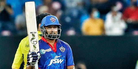 Prithvi Shaw of DC celebrates his half century during qualifier 1 match of IP: 2021 agaisnt CSK at the Dubai International Stadium in Dubai on Sunday. (Photo | ANI)