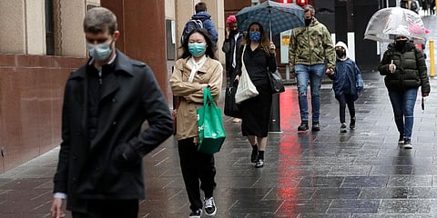 People filter into the city after more than 100 days of lockdown to help contain the COVID-19 outbreak in Sydney. (Photo | AP)