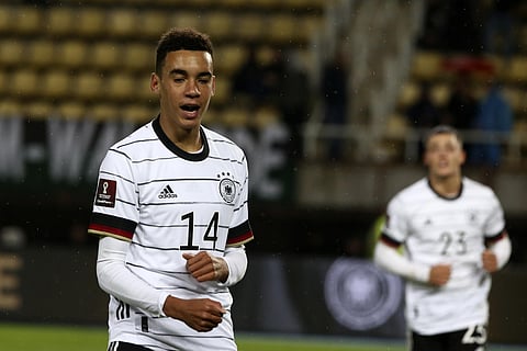 Germany's Jamal Musiala celebrates after scoring his side's fourth goal during the World Cup 2022 group J qualifying soccer match between North Macedonia and Germany. (Photo | AP)