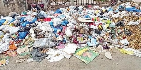 Garbage piled up on the roadside in Hyderabad on Friday. (Photo | RVK Rao, EPS)