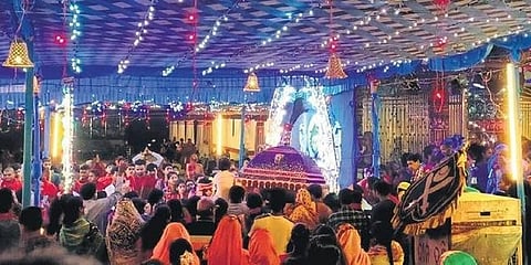 Locals crowd a puja pandal in Jeypore town of Koraput district. (Photo | EPS)