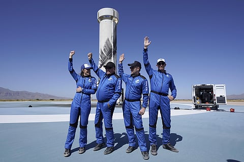 Blue Origin's New Shepard rocket latest space passengers from left, Audrey Powers, William Shatner, Chris Boshuizen, and Glen de Vries raise their hands during a media availability. (Photo | AP)