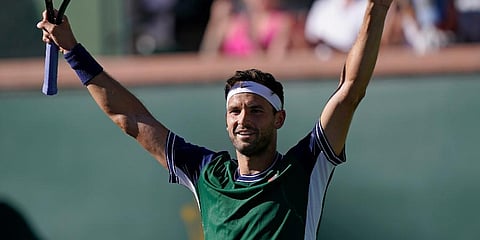 Grigor Dimitrov, of Bulgaria, celebrates after defeating Daniil Medvedev, of Russia, at the BNP Paribas Open tennis tournament Wednesday, Oct. 13, 2021, in Indian Wells, California. (Photo | AP)