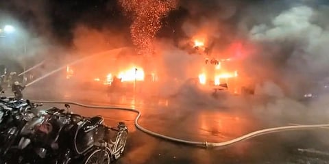 Firefighters battle a blaze at a building in Kaohsiung, in southern Taiwan. (Photo | AP)