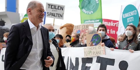 Olaf Scholz, SPD candidate for Chancellor arrives at the venue for exploratory talks between the SPD, FDP and the Green Party on the formation of a new federal government, Oct 15, 2021. (Photo | AP)