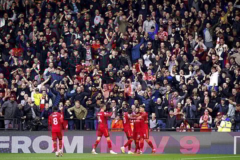 Liverpool's Roberto Firmino, right, celebrates after scoring goal during Premier League match against Watford at Vicarage Road, Watford, England, Saturday. (Photo | AP)